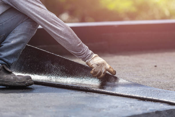 Professional Exterior Waterproofing technician working in Morrisonville, NY